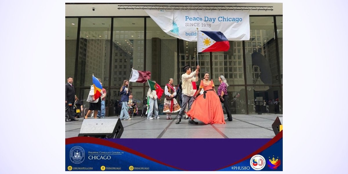 Janice Delima Carries Philippine Flag at the 48th Anniversary of Peace Day in Chicago